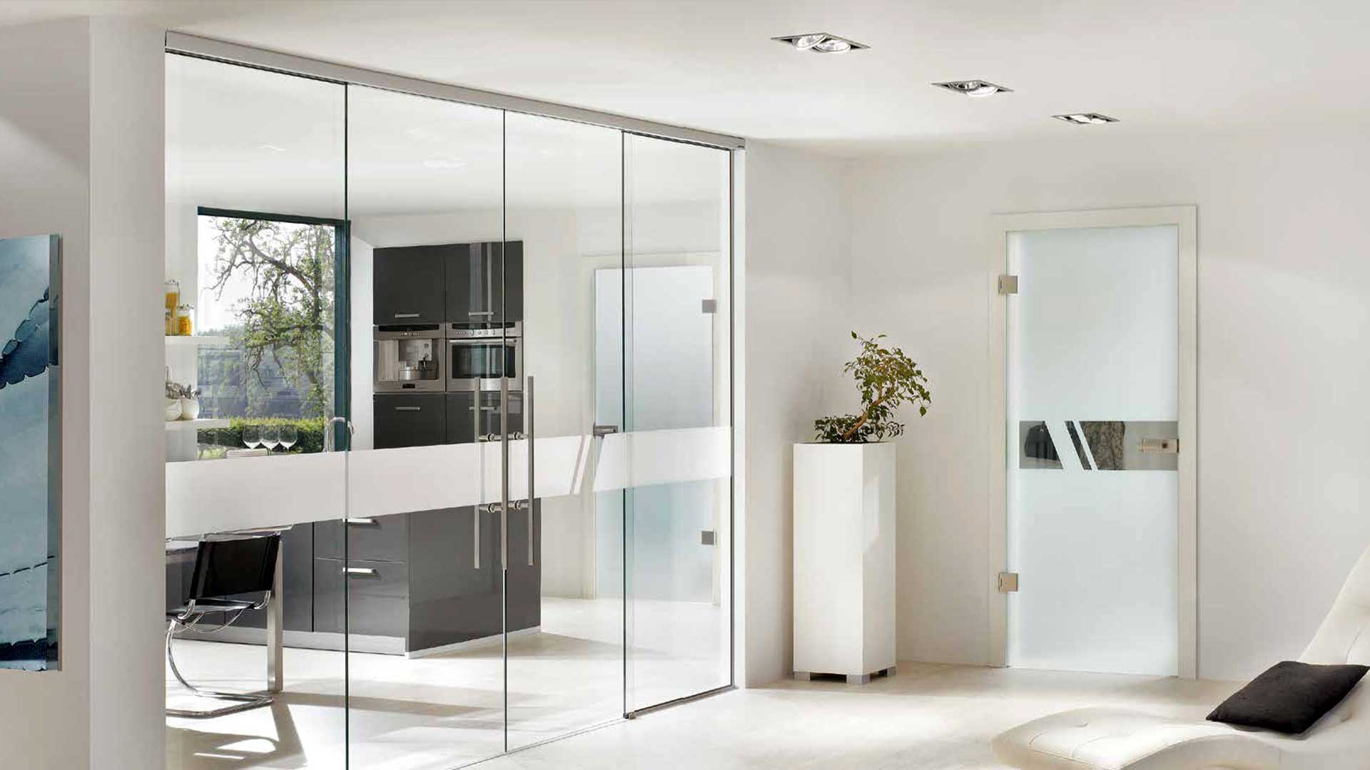 Frameless glass door with patch fittings installed by Sonali Enterprises in Pune
